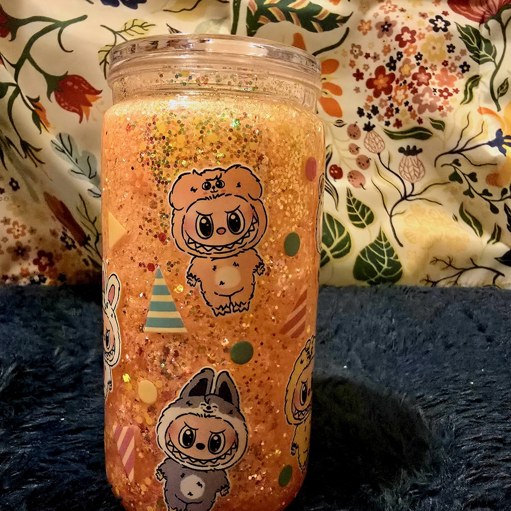 Festive Orange Glitter Jar with Cute Characters